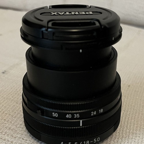 Pentax K-70 SLR digital camera with two lenses and accessories