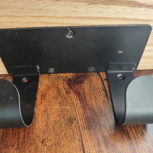 Wall hanger used with storage space
