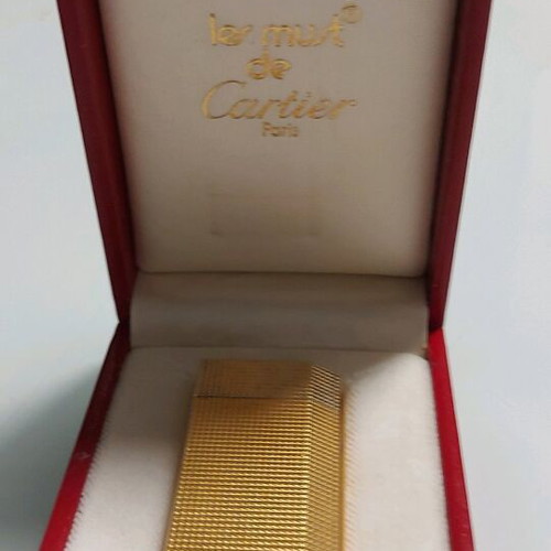 Cartier mod pentagon lighter used with heart box