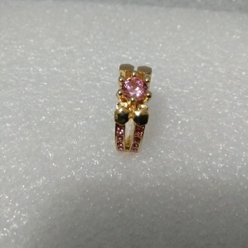 Ring with pink stones like new, gold plated size 6