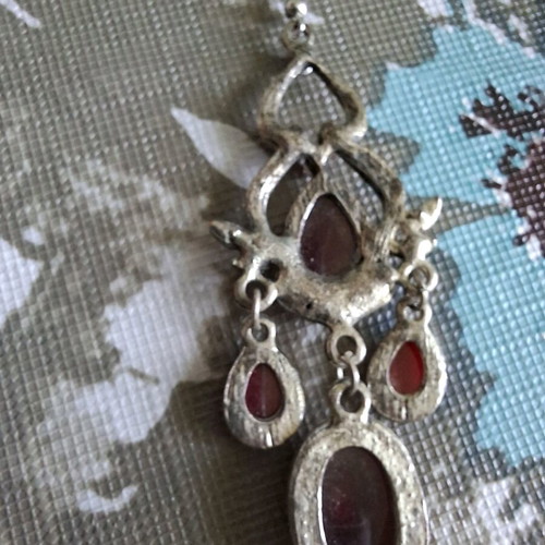 Earring red used, single