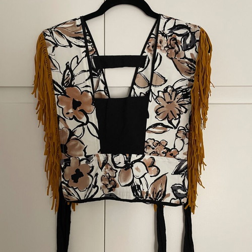 Jerkis vest one size, like new, colorful print with fringes