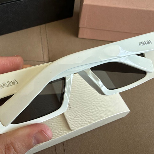 Prada SPR24Y sunglasses like new, white frame, unisex