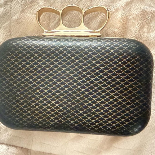Evening bag like new with unique clasp and black-gold rhinestones