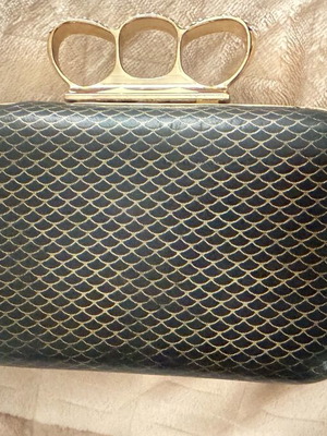 Evening bag like new with unique clasp and black-gold rhinestones