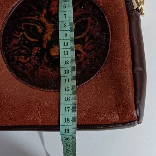 Crossbody bag brown new with unique design