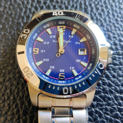 North Eagle wristwatch used with day counter and phosphorescent hands