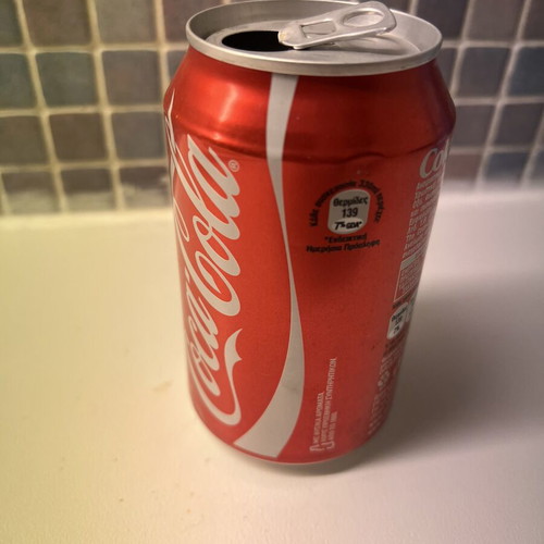 Coca Cola Woman collectible used, empty can