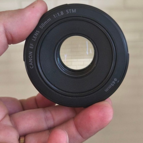 Canon EF 50mm f/1.8 STM lens with hood