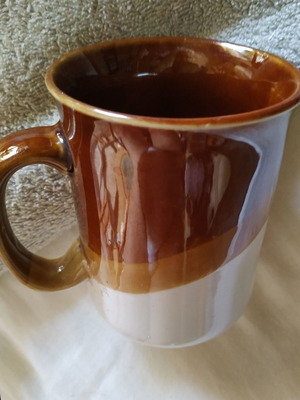 Coffee mug with brown and cream colors, cute