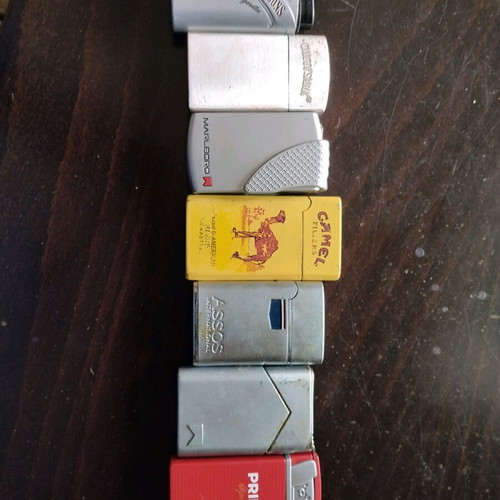 Collection of 7 used vintage metal lighters pack