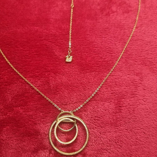 Swarovski necklace like new, gold color