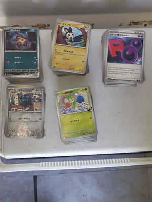 Pokémon cards used, approximately 630 common cards with duplicates
