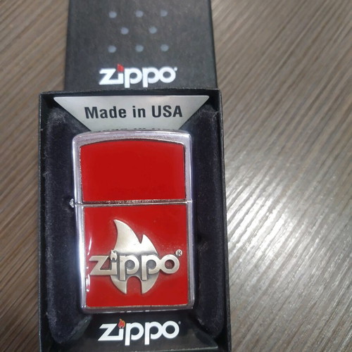 Zippo flame red new with case and replacement stones