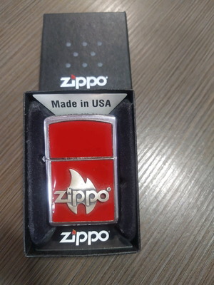 Zippo flame red new with case and replacement stones