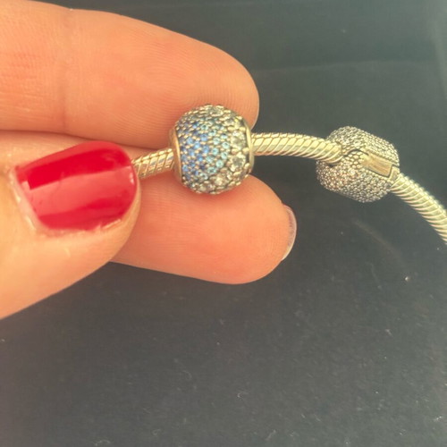 Pandora silver bracelet new with 4 charms and zirconia