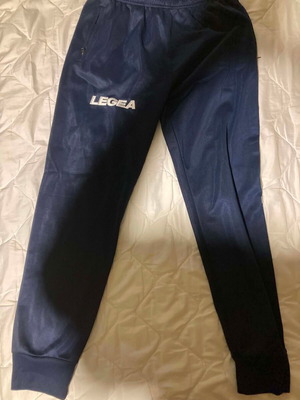 Legea sports pants used, size M, blue with zip pockets and elastic cuffs