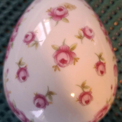 Porcelain decorative container used, small egg with pink flowers