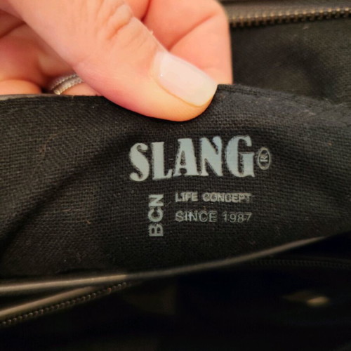 Slang backpack like new gray with multiple compartments
