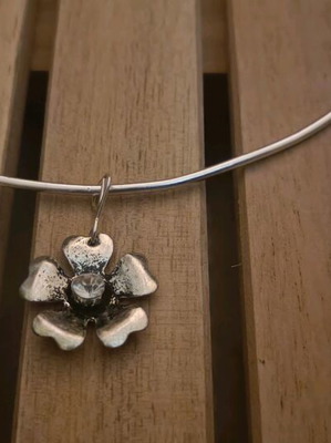 Silver-colored handmade necklace with flower like new