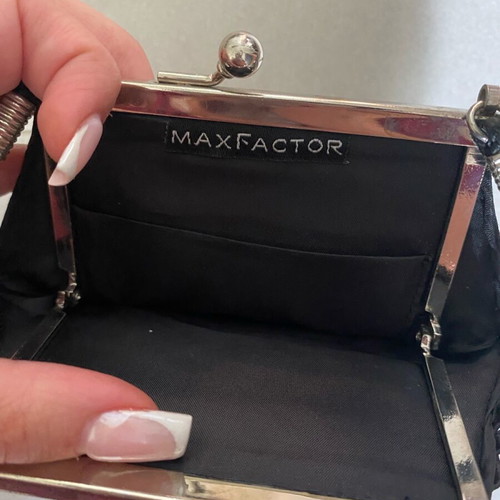 Vintage Max Factor black clutch handbag used