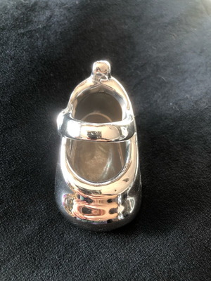Decorative baby shoe like new, porcelain or silver-plated