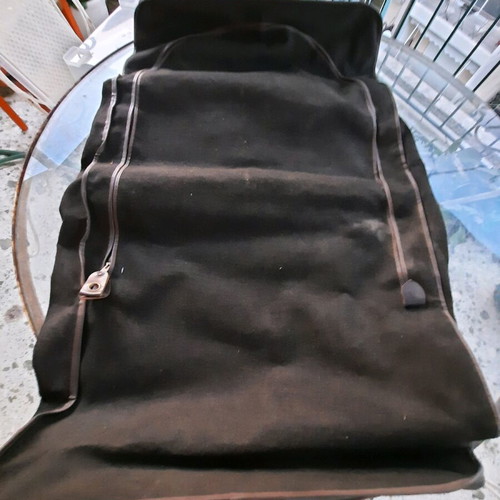 Travel sack used, brown, waterproof fabric with leather details
