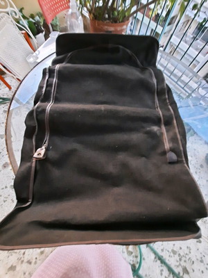 Travel sack used, brown, waterproof fabric with leather details