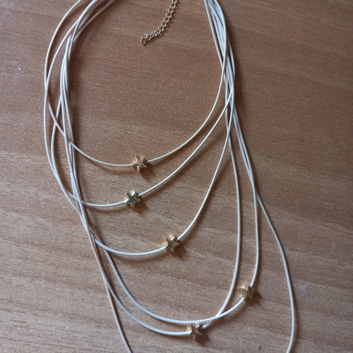 Star Necklace with Beige Cord and Multiple Layers Like New