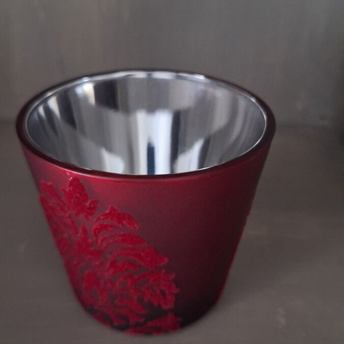Glass candlestick like new with embossed velvet and silver glazing