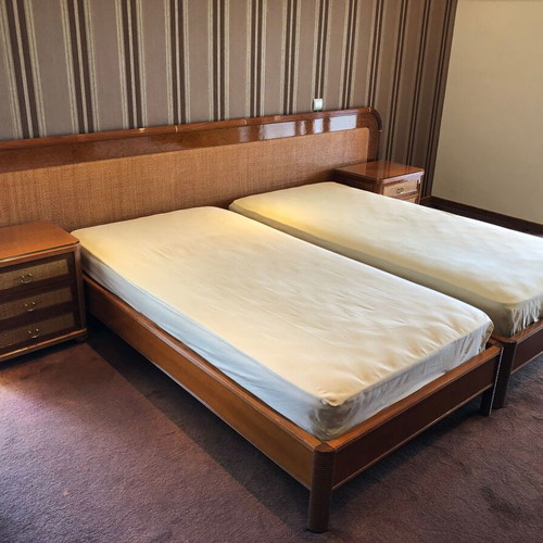 Bedroom set used with two single beds, nightstands and dressing table