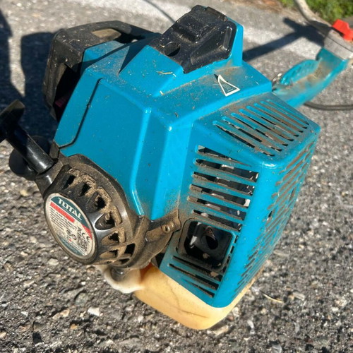 Brushcutter with metal 3T blade, professional shoulder strap, used