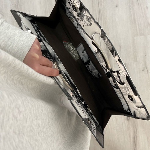 Vintage newspaper print clutch bag with metal handle, black and white