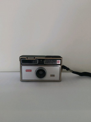 Kodak Instamatic 100 camera used with leather case