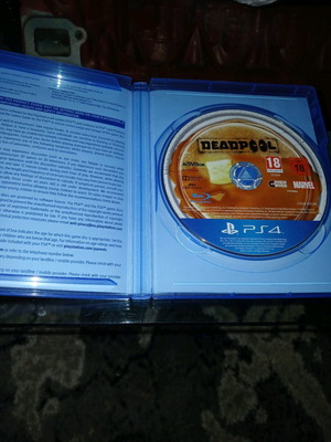 Deadpool PS4 game like new, collectible