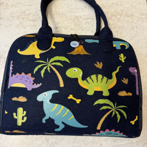 Montessori activity bag with dinosaur design, felt busy board