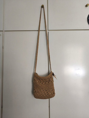 Woven straw bag like new with decorative beads crossbody