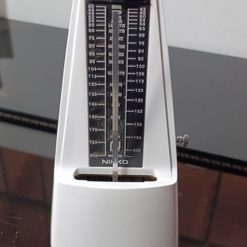 Mechanical metronome used with plastic body and metal mechanism