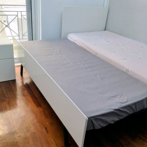 Convertible children's bed like new with desk and bedside table