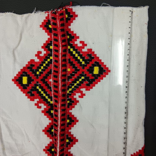 Collectible traditional fabric with embroidered pattern No 114 used