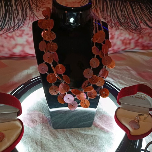 Layered handmade necklace with natural shells and beads
