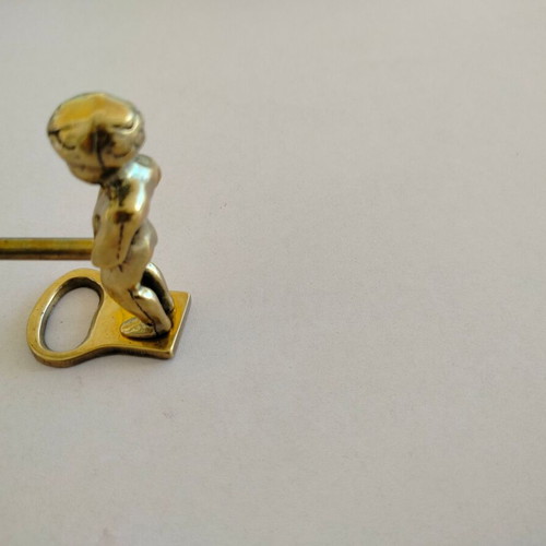 Brass corkscrew opener used with minor metal wear