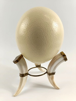 Tripod base used from fakocheros teeth with ostrich egg