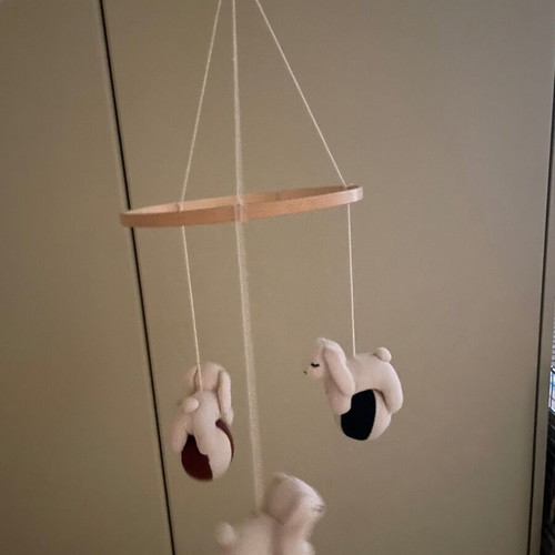 Konges Sløjd crib mobile like new with wooden base and fabric toys