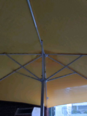 Umbrella like new, water-resistant polyester canopy with UV protection