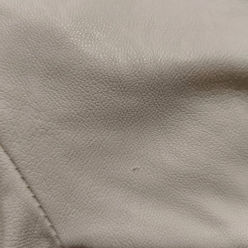 Light beige faux leather pants used with 2 small scratches