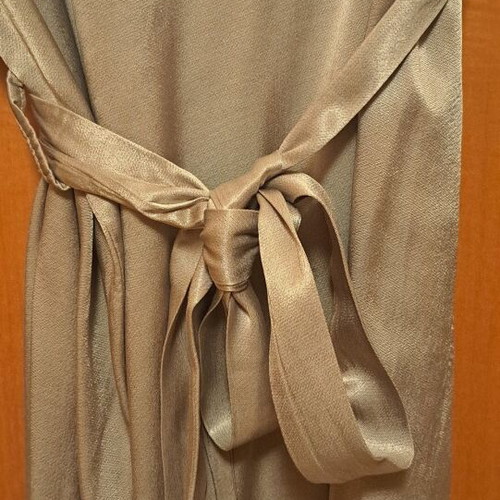 Satin dress new, beige, long sleeve with one shoulder exposed