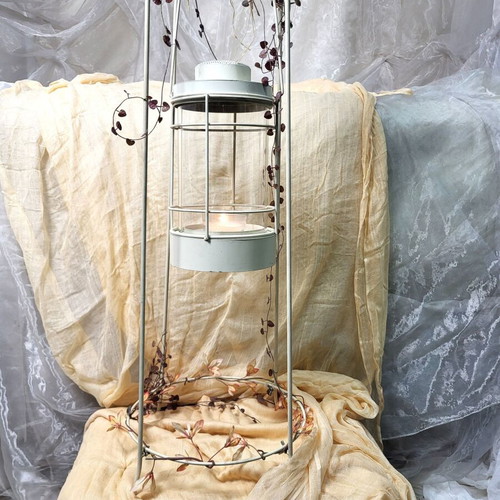 Floor metal lantern with iron base like new, vintage/industrial style