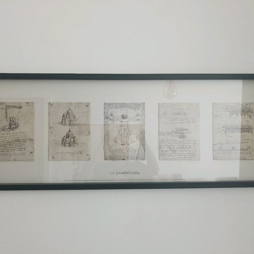 Various art prints and one banner like new with Da Vinci works