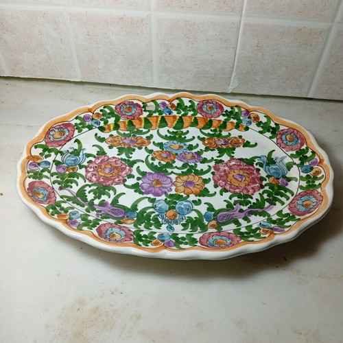 Oval platter Skyrian folk art like new with hand-painted flowers